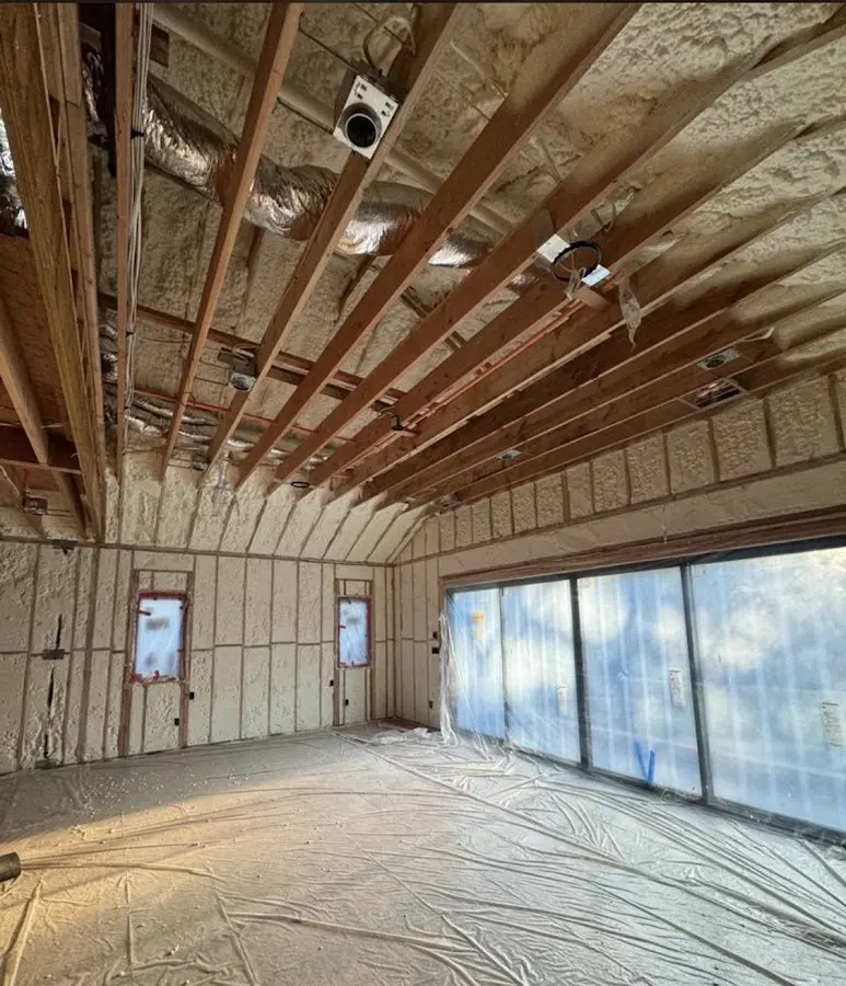 Interior walls and ceiling insulated with spray foam during new construction in Forest Glen